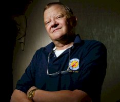 Tom Clancy, doma v Baltimoru (1.8.2003) – Profimedia.CZ